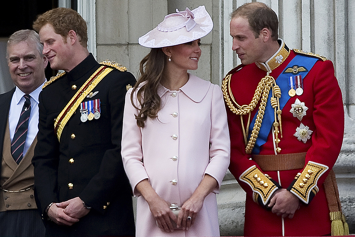 File picture shows Britain's Prince William and his pregnant wife Catherine, Duchess of Cambridge standing on the balcony of Buckingham Palace in London